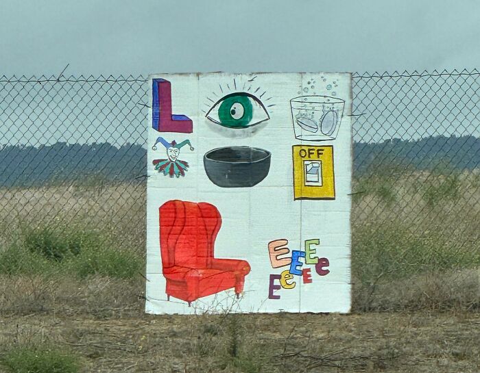 A colorful mural with various images like a red armchair, a green eye, a jester, and letters, presenting a complex brain puzzle.