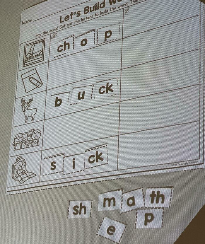 A worksheet to build words from letter tiles, an educational brain puzzle for learning.