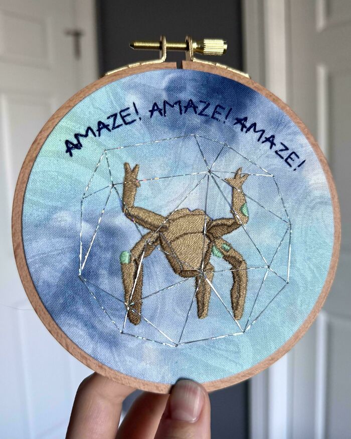 Embroidery project featuring a crab in a geometric shape with the words Amaze Amaze Amaze