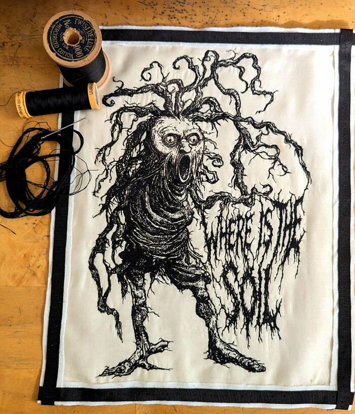 Spooky tree creature with text, black thread embroidery projects