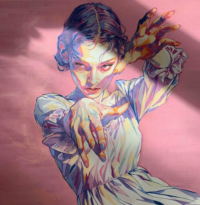 Vibrant handmade project of a stylized woman's portrait with dramatic lighting and expressive hands, showing artistic talent.