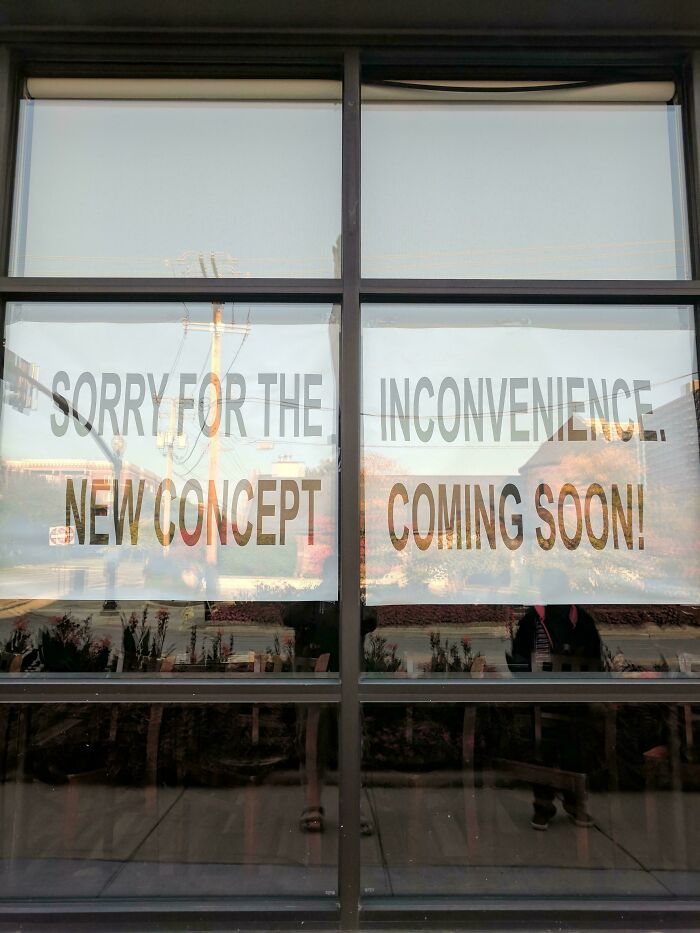 Window sign apologizing for inconvenience, new concept coming soon displayed clearly
