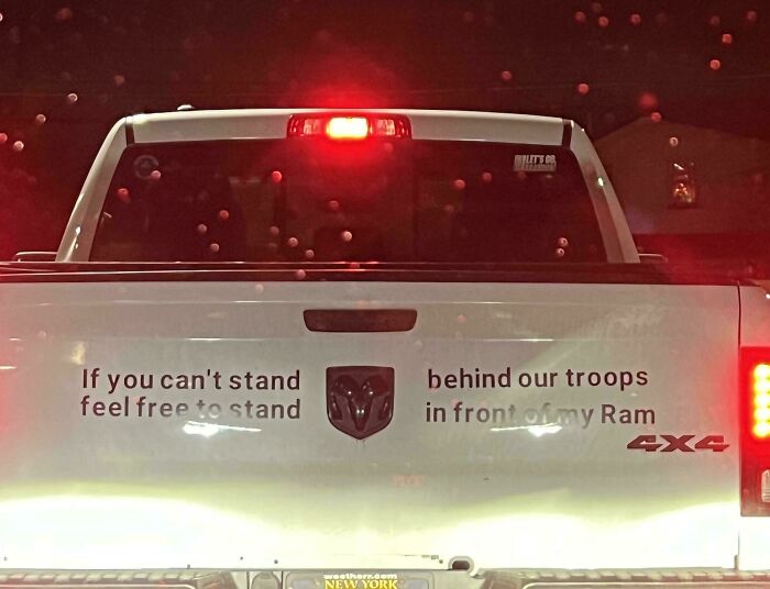 Pickup truck with troops support bumper sticker