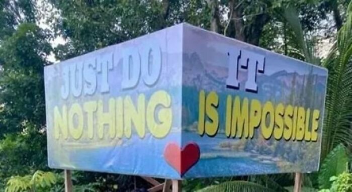 Funny motivational sign with confusing message about nothing being impossible