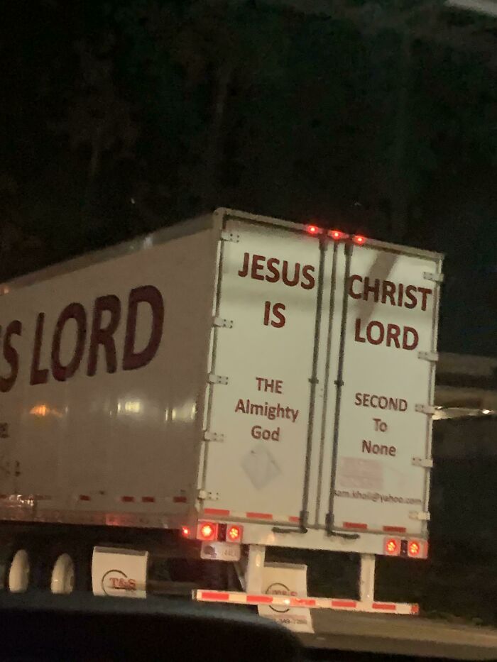 Back of a truck with Jesus Christ is Lord religious message