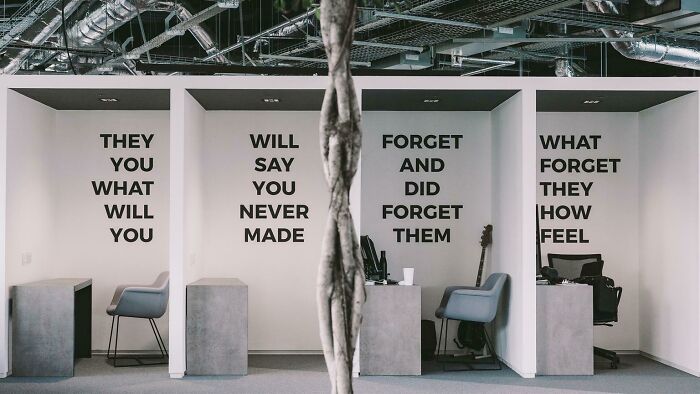 Funny office wall signs with motivational text missing proper safety messaging
