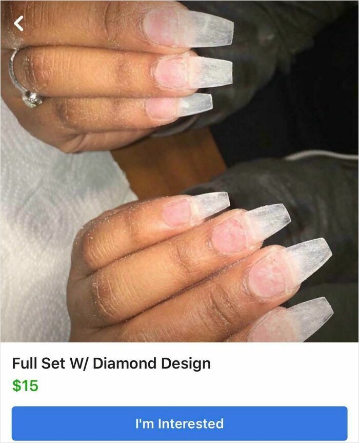 Two hands with clear, long, and uneven acrylic nails, revealing an unflattering beauty salon nail extension.