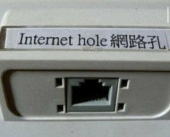 Label humorously naming an ethernet port as internet hole.