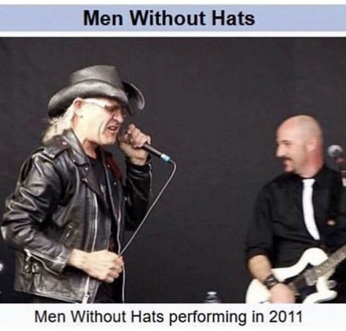 Men Without Hats band member ironically wearing a hat during performance