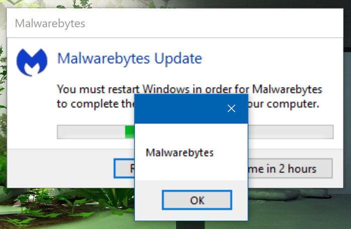 Comical Malwarebytes update prompt requiring Windows restart shown humorously