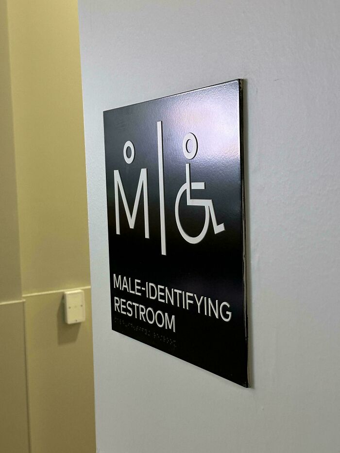 Restroom sign incorrectly labeled as male-identifying restroom showing design fail