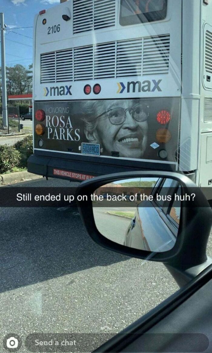 Bus with Rosa Parks image ironically stuck behind another vehicle