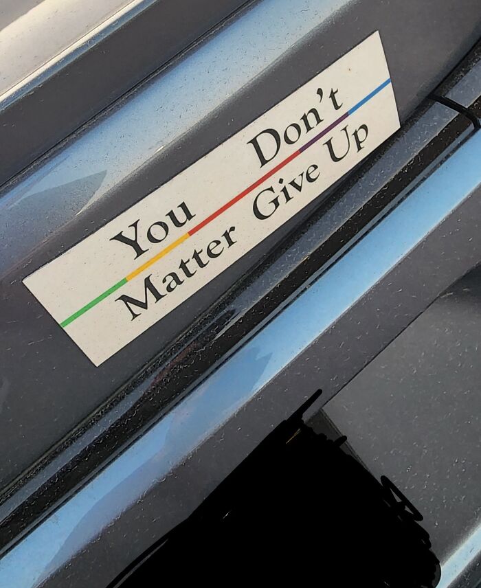 Sticker with confusing message You Dont Matter Give Up sign design fail