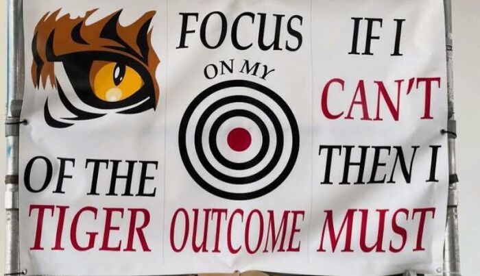 Banner with confusing and poorly spaced motivational quote design fail