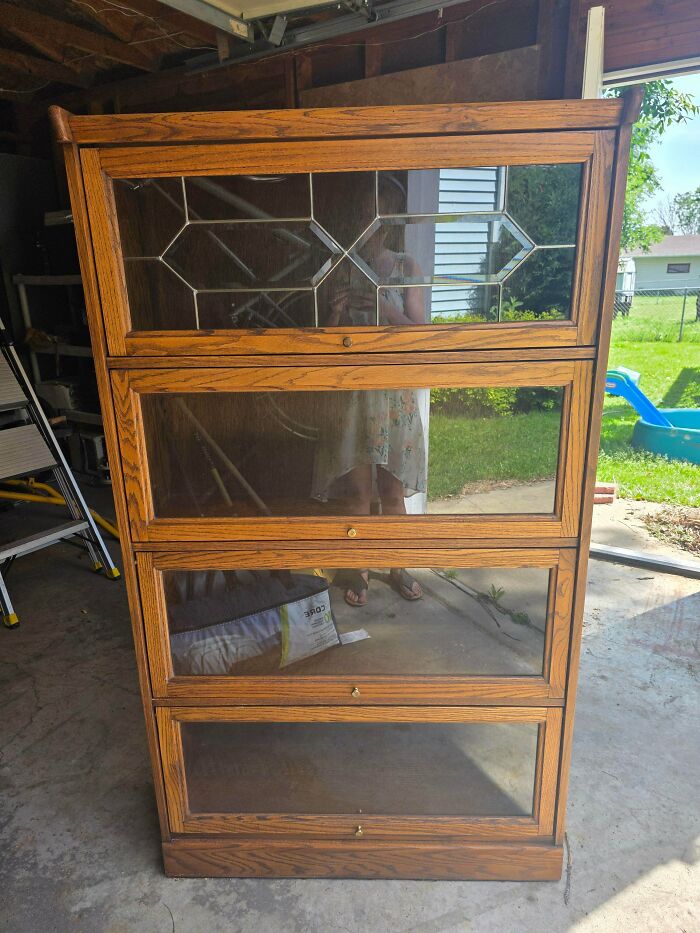 Four tier oak barrister bookcase with glass doors, a classic antique treasure