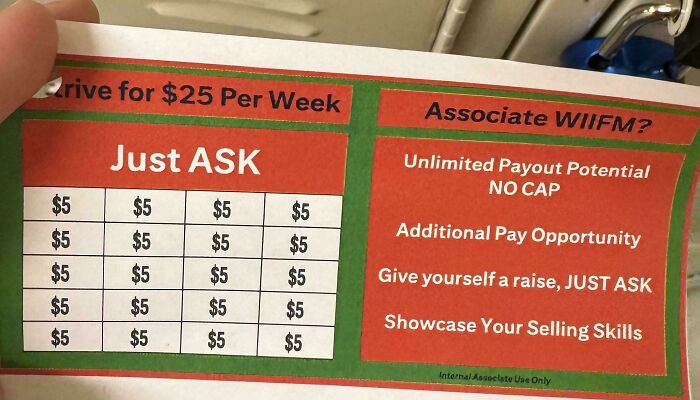 A hand holding a selling skills card for Home Depot employees with a five dollar grid.