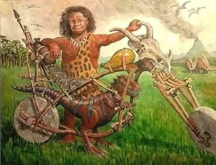 Caveman with a dinosaur-themed motorcycle, a peculiar thing spotted in real life.