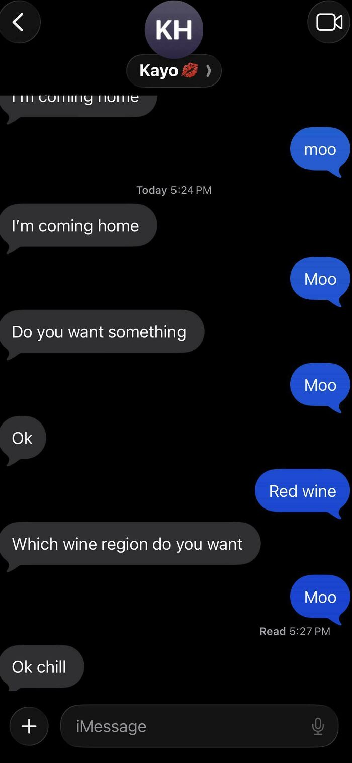 A screenshot of a text message conversation, from the Not Interesting community, about bringing home wine.