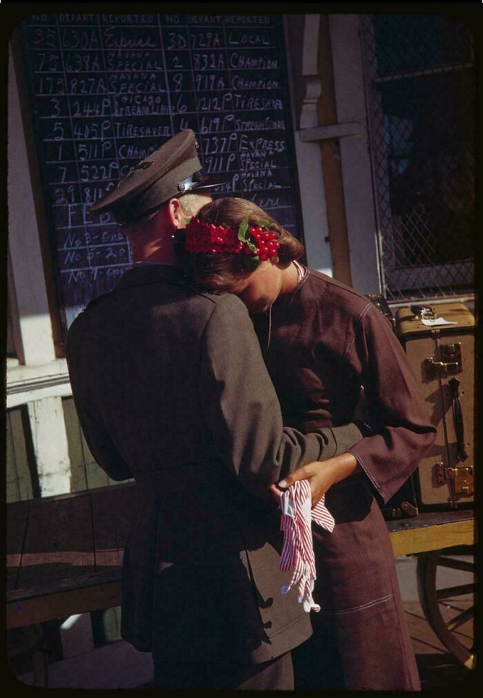 Historical photos of a soldier hugging a woman wearing a red floral headband at a train station.
