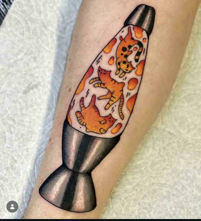 A colorful lava lamp tattoo with orange cats floating inside, a creative design among stunning tattoos.