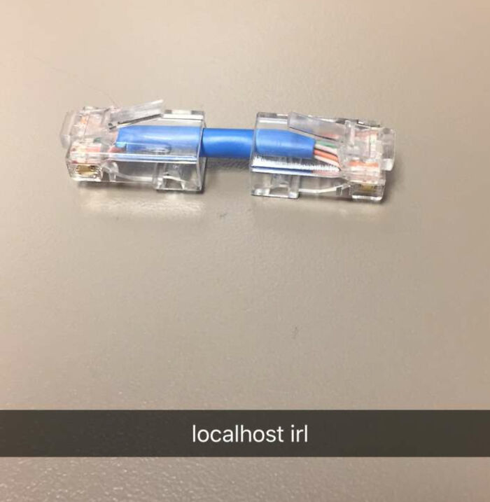 An image of an Ethernet cable with two male ends connected by an adapter, an example of electronics fails.
