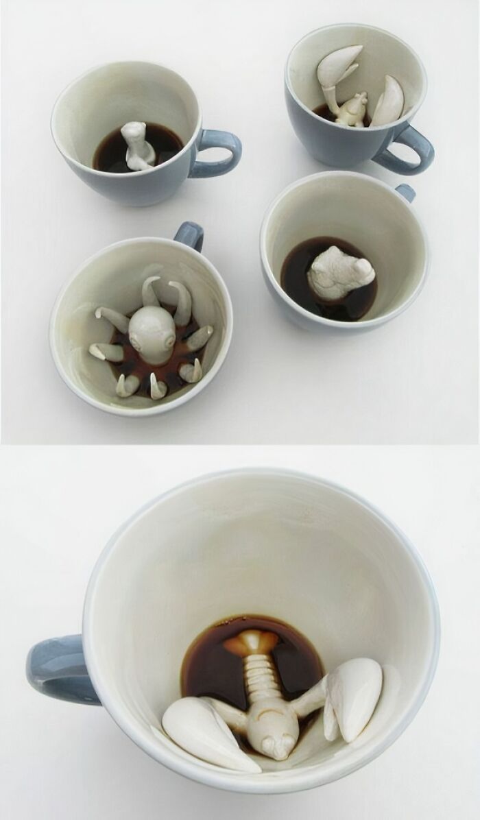 Creative coffee mugs with sculpted crab, octopus, and claw figures inside