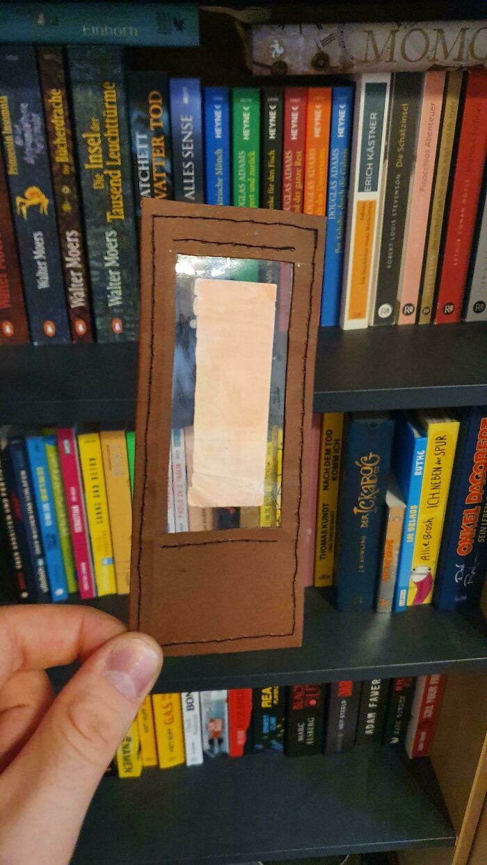 A handmade bookmark with a window, a creative project requiring patience and talent.