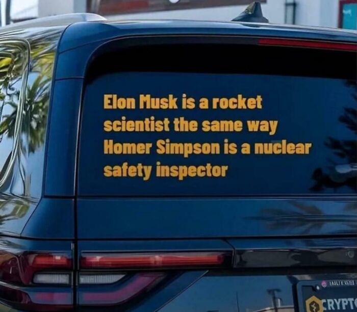 Bumper sticker comparing Elon Musk to Homer Simpson