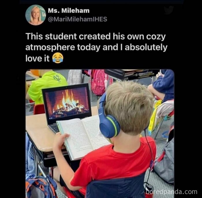 Child reading with headphones and cozy fireplace on laptop meme