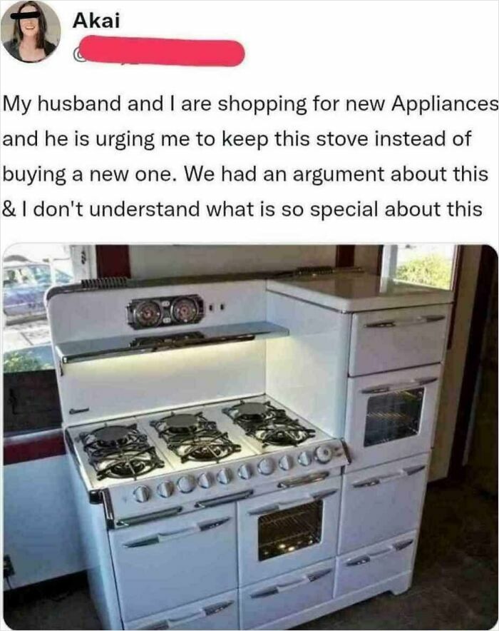 A vintage white stove with multiple burners, ovens, and storage compartments, a post for entertained at work.