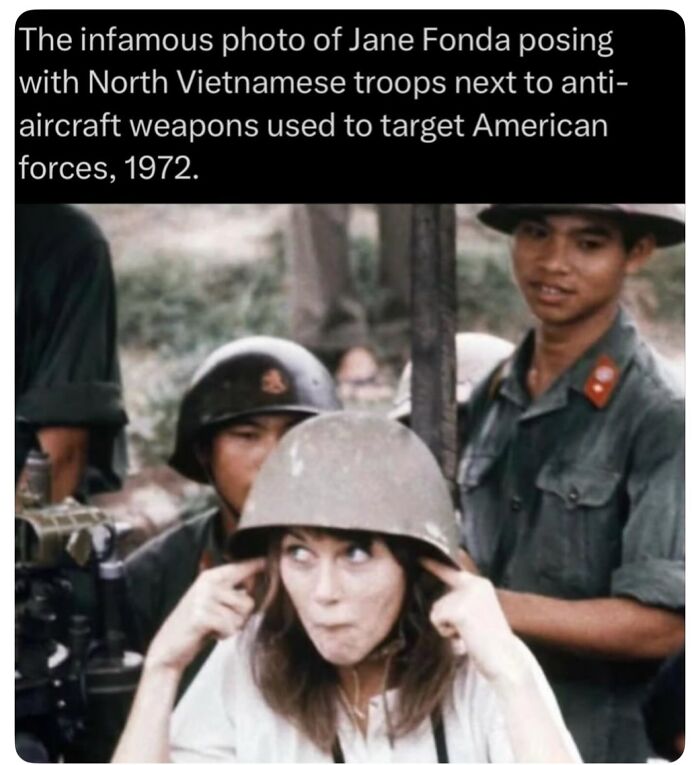 Jane Fonda posing with North Vietnamese troops and anti-aircraft weapons, important history of wars.