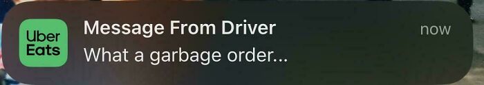 Uber Eats message from driver calling a food delivery order garbage, highlighting a food delivery fail.