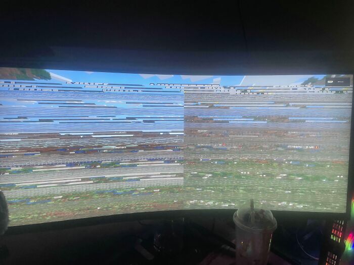 Glitched computer screen with horizontal lines, a common visual electronics fail.