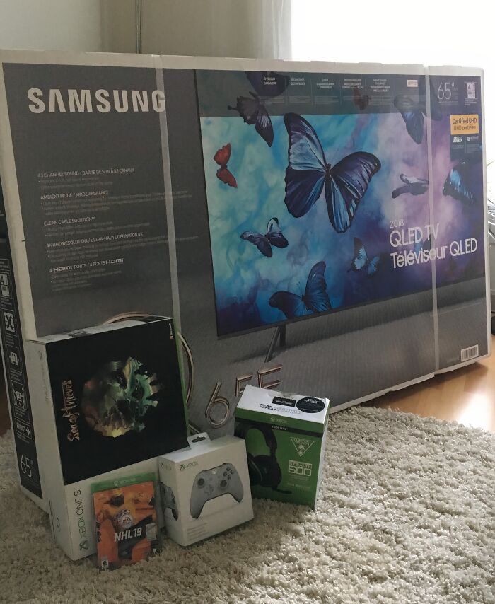 Large Samsung TV box with Xbox games and accessories, a gift from amazing fathers.