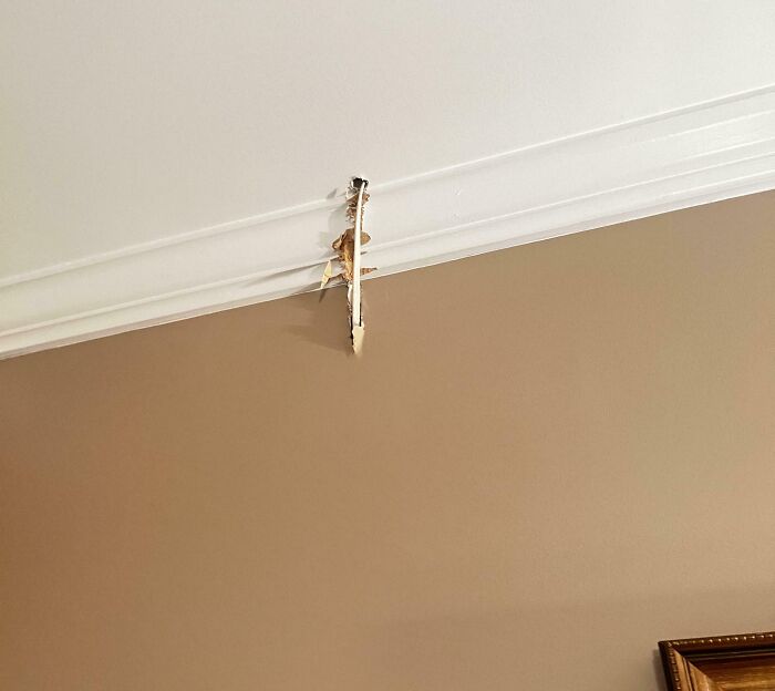 Damage to a wall and ceiling showing an electronics fail, emphasizing installation errors.