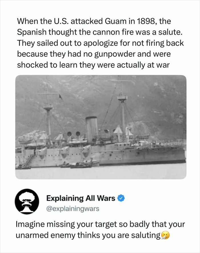 A black and white image of a battleship, illustrating the historical event of the US attack on Guam and the Spanish reaction to the war.