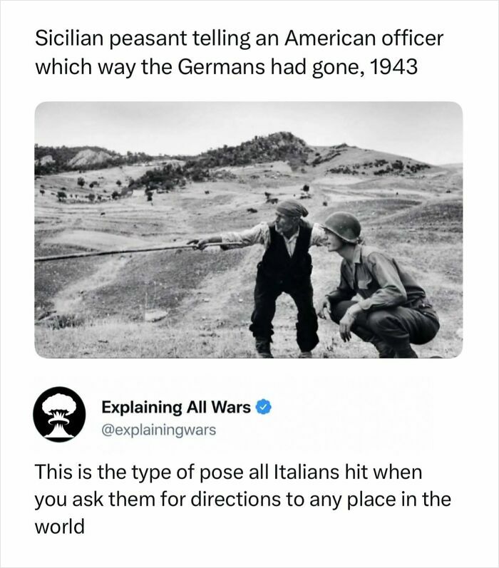 A black and white image of a Sicilian peasant pointing, giving directions to an American officer, depicting a moment in history during wars.