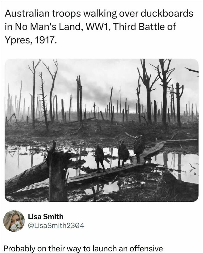 WW1 history photo: Australian troops on duckboards in No Man's Land at Ypres, explaining all wars.