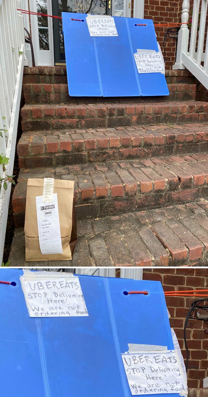 Funny food delivery fails: a food delivery left on steps despite signs that say 'Uber Eats stop delivering here we are not ordering food'.