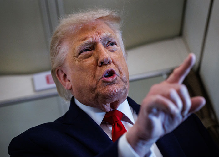 Former President speaking with intense expression pointing finger Former President speaking with intense expression pointing finger
