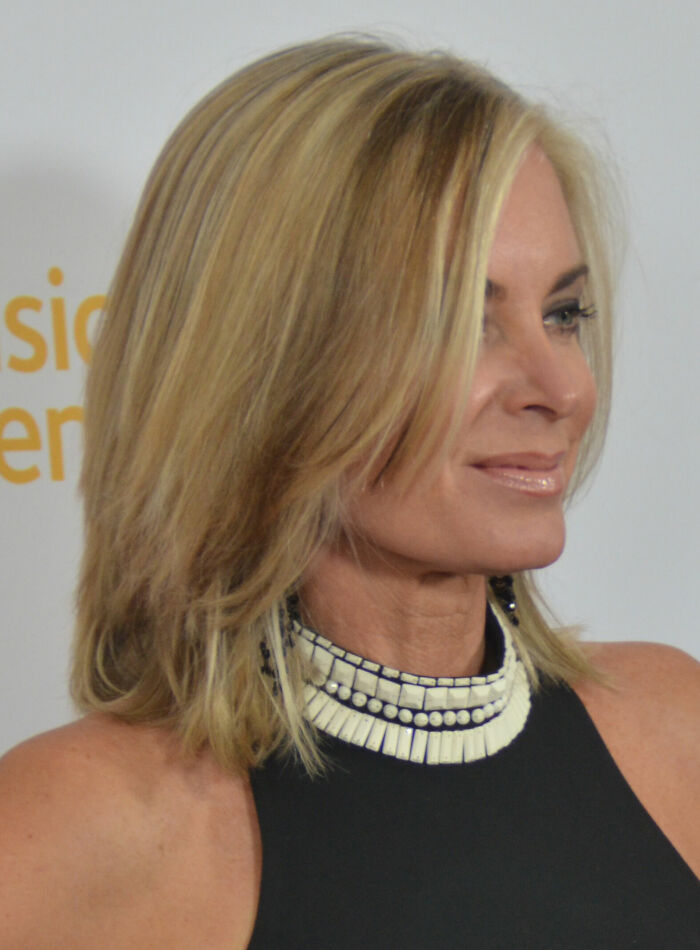 Close-up of actress Eileen Davidson with blonde hair and stylish necklace at event