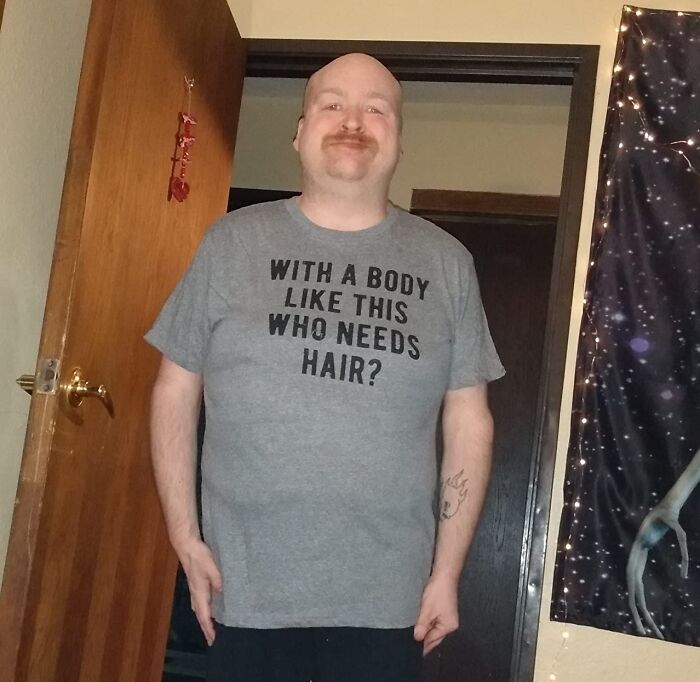 Man wearing humorous gray t-shirt as a funny Father's Day gift idea