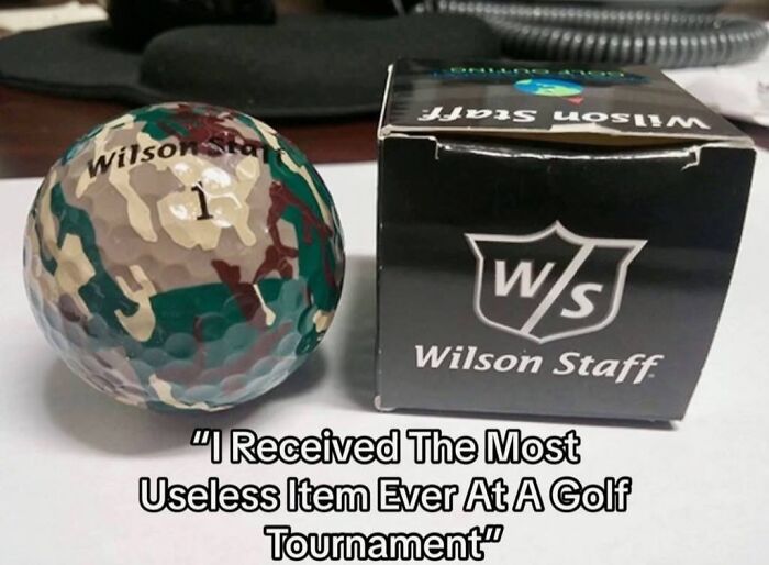 Useless golf tournament item with a camouflage golf ball