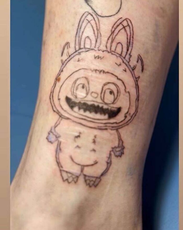 Sketchy bunny character tattoo fail with unclear details