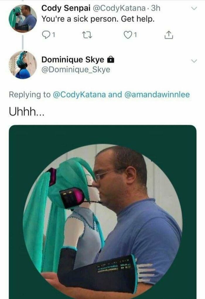 A man kissing a Hatsune Miku figure, a cringy and incredibly sad image.