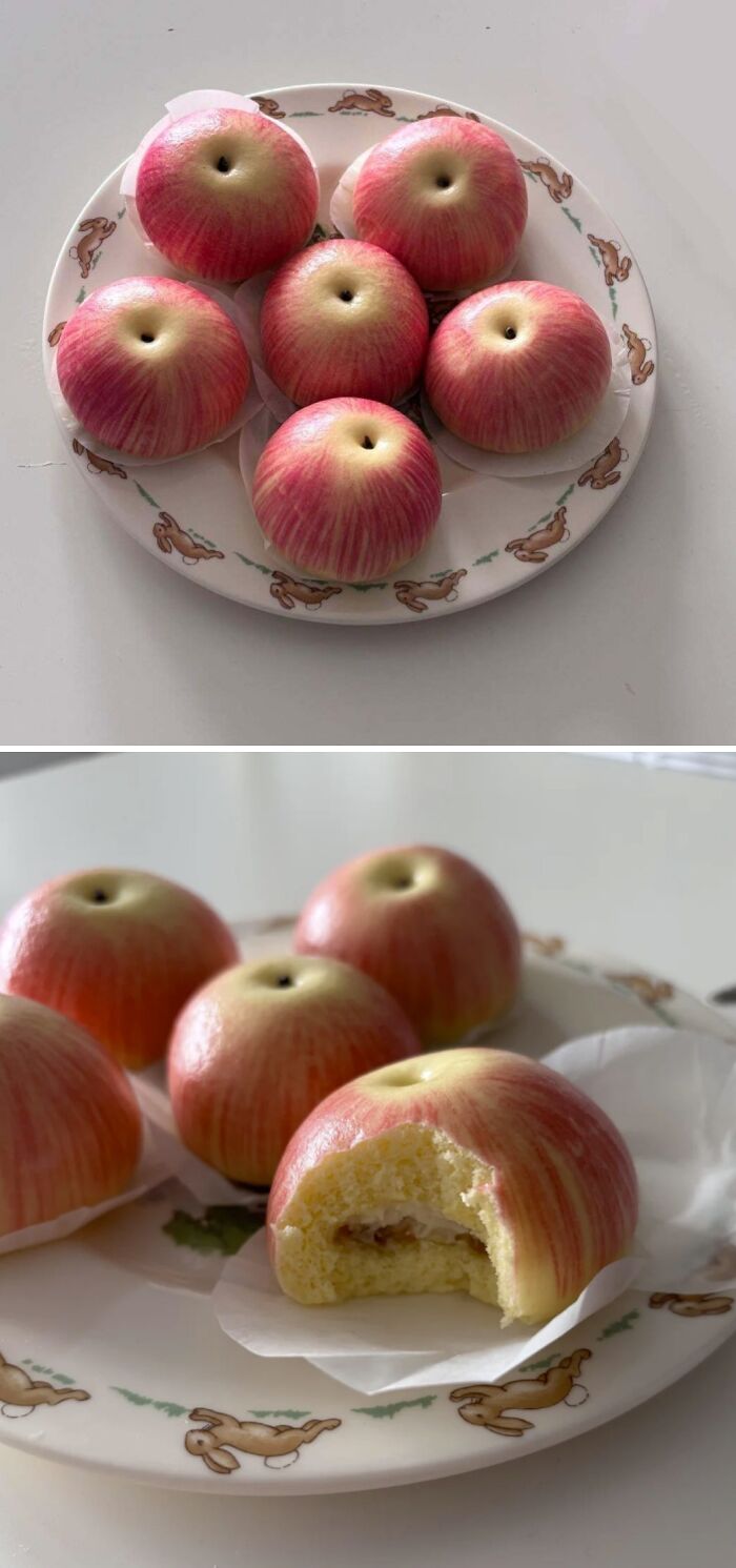 Realistic apple-shaped dessert on plate with bite revealing cake
