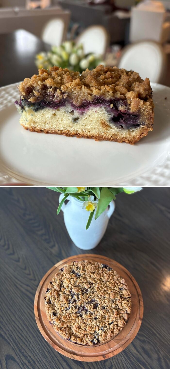 Blueberry crumb cake slice on white plate showcasing dessert texture and crumb topping