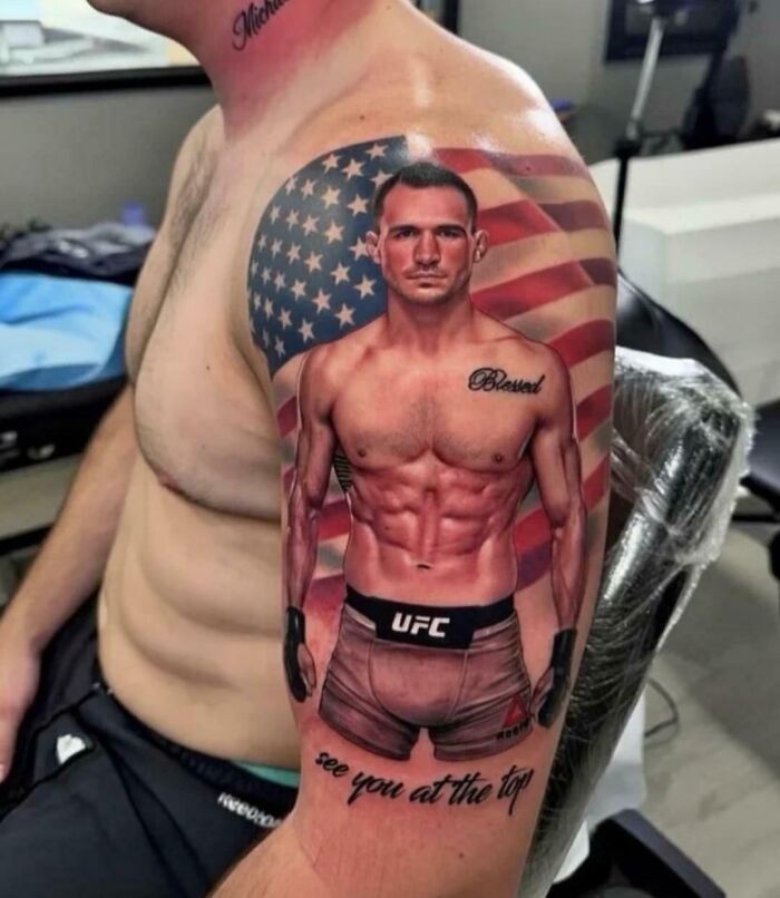 Tattoo of a UFC fighter on arm with realistic but unusual design
