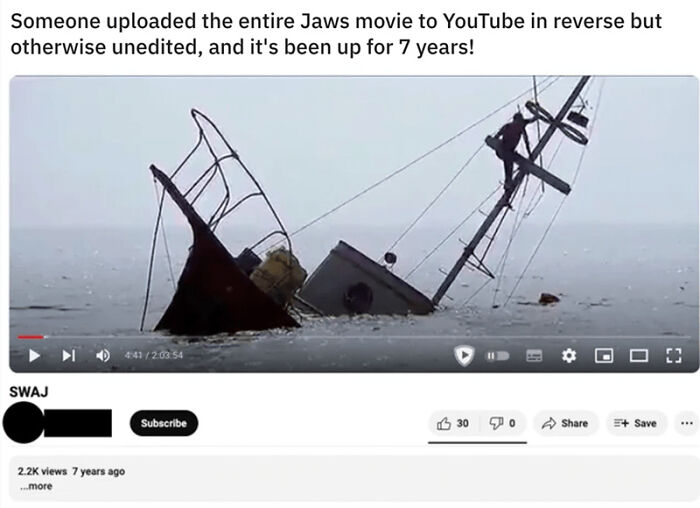 A screenshot of a YouTube video of the movie Jaws uploaded in reverse by a Mad Lad.