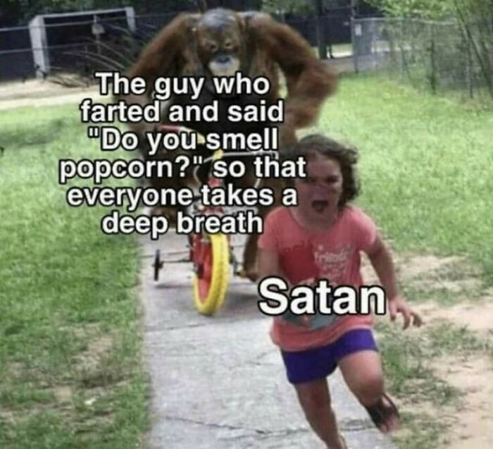 A Mad Lad meme showing a gorilla chasing a child, captioned The guy who farted and said Do you smell popcorn? so everyone takes a deep breath, and Satan.